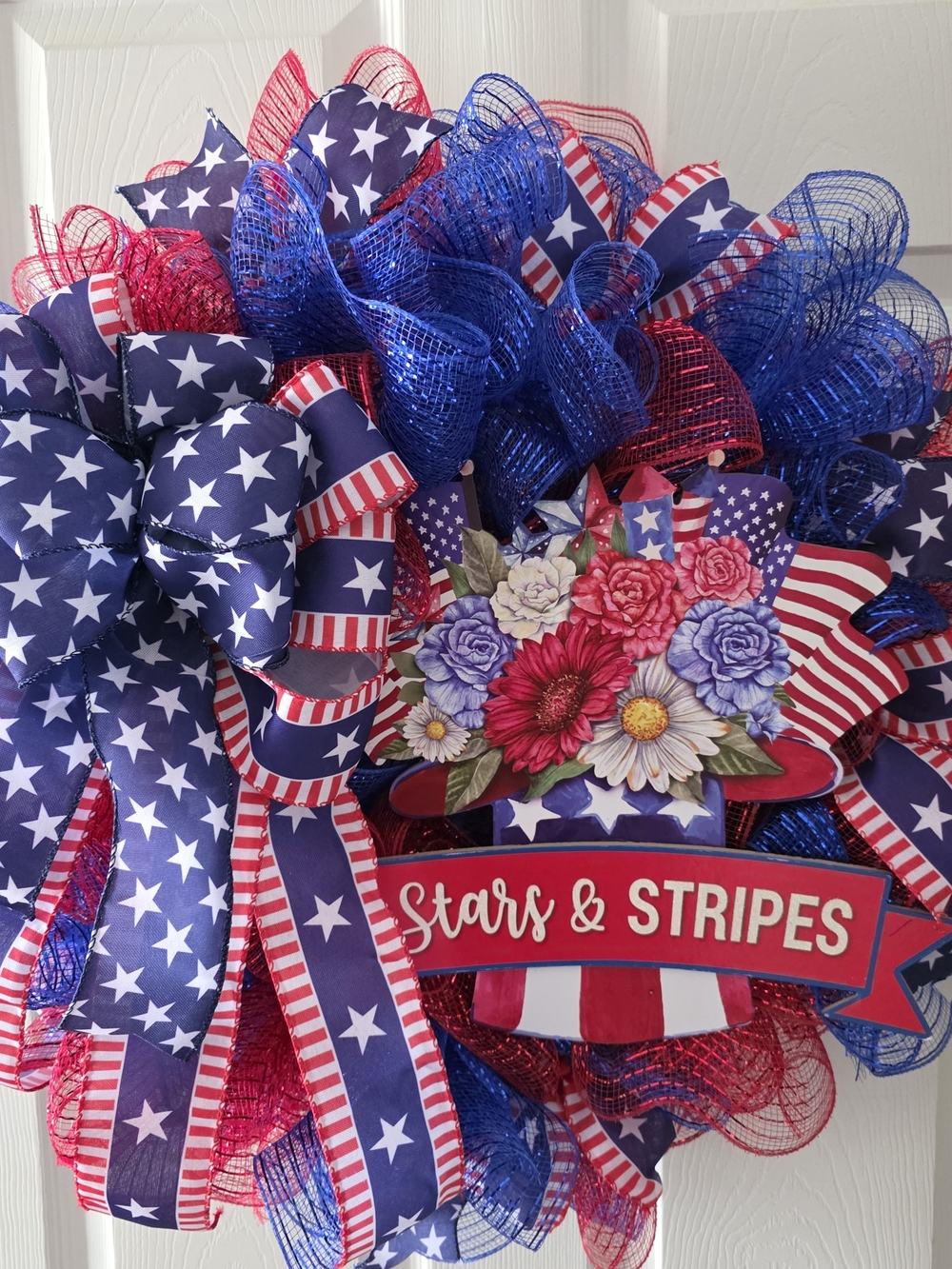 Patriotic Stars & Stripes Wreath with Floral Accent